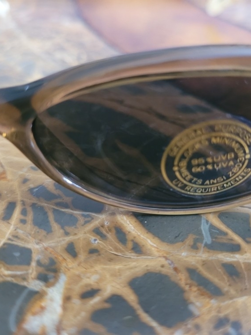 Sleek Oval Brown Sunglasses with Burgundy Case - Picture 3 of 6